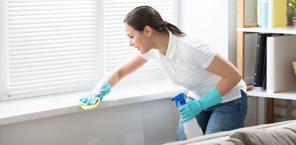 Woman cleaning a house